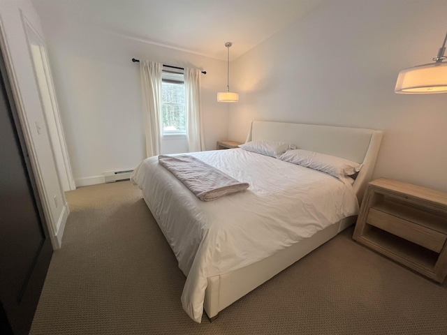 bedroom featuring light colored carpet, baseboards, and baseboard heating