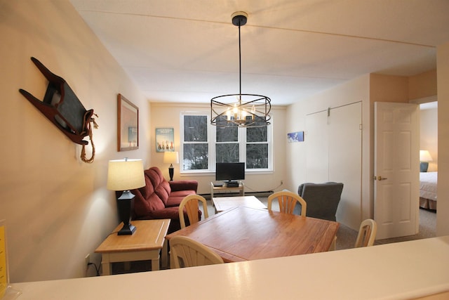 dining area with a notable chandelier