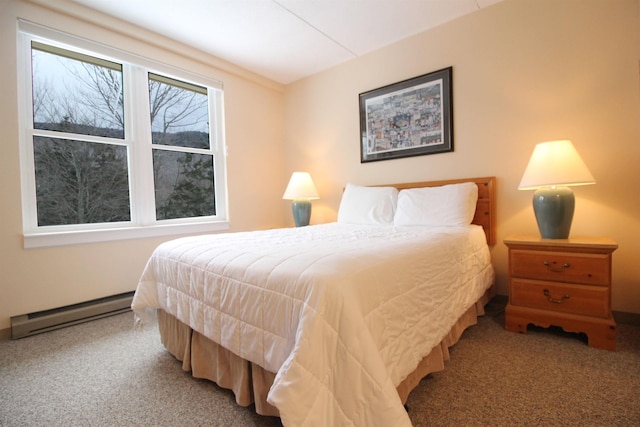 carpeted bedroom featuring a baseboard radiator