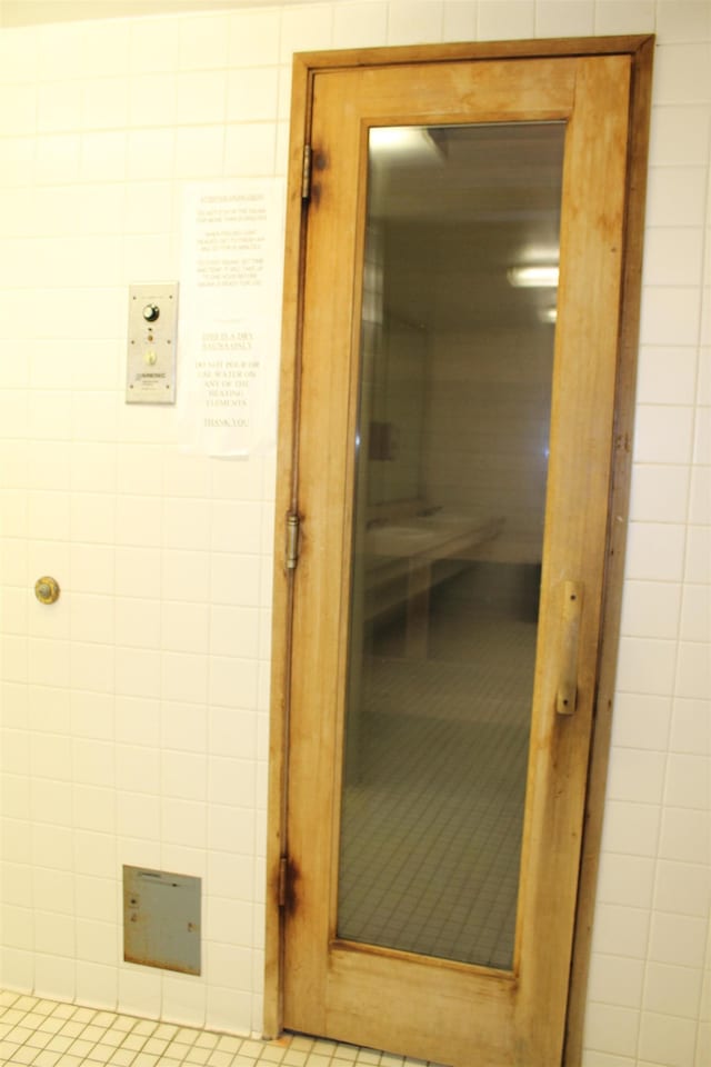 view of sauna with tile patterned floors