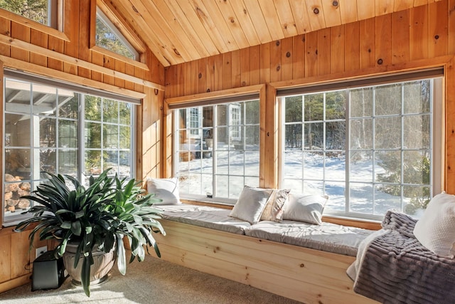 sunroom / solarium with wooden ceiling and lofted ceiling