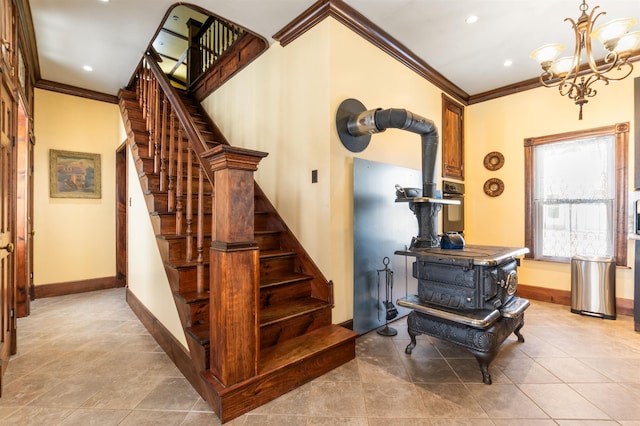 stairway featuring a notable chandelier, recessed lighting, baseboards, tile patterned floors, and crown molding