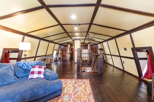 living room with wood-type flooring, vaulted ceiling, and a ceiling fan