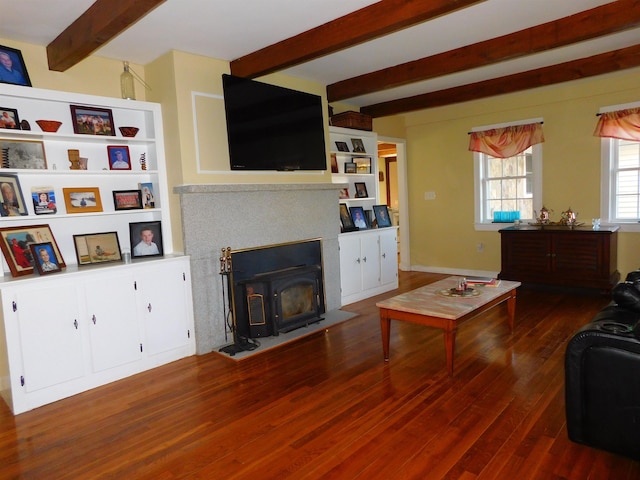 living room with beamed ceiling and wood finished floors