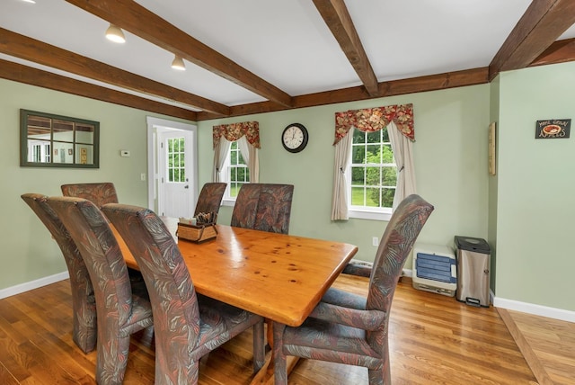 26 Hilltop Dr, Wakefield, NH 03872 - dining area featuring beamed ceiling, wood finished floors, and baseboards
