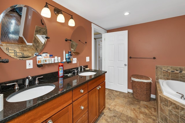 26 Hilltop Dr, Wakefield, NH 03872 - full bathroom featuring a bath, double vanity, and baseboards