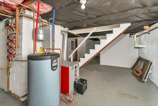 26 Hilltop Dr, Wakefield, NH 03872 - unfinished below grade area featuring water heater and stairway