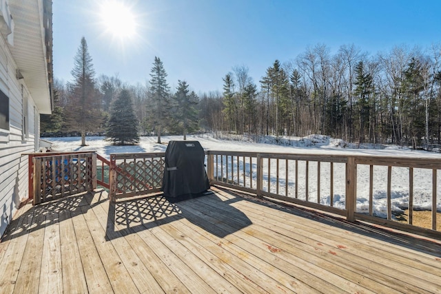 view of snow covered deck