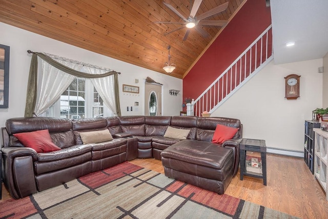 living room with high vaulted ceiling, wood ceiling, stairs, baseboard heating, and light wood finished floors