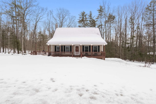 chalet / cabin with covered porch