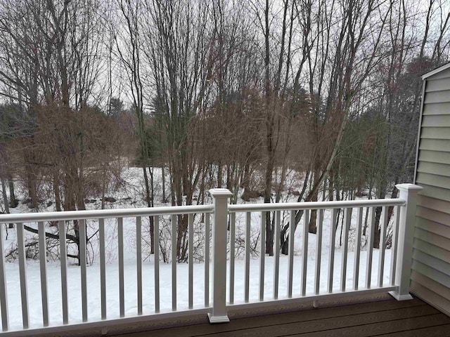 view of snow covered deck