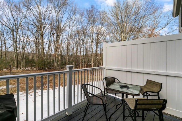 wooden terrace with area for grilling