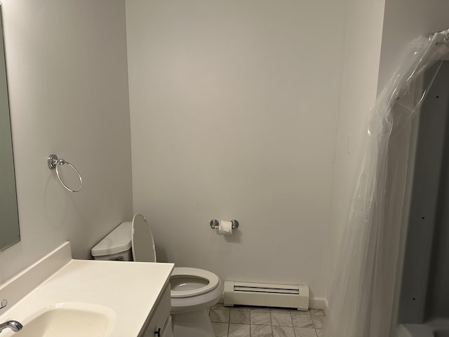 full bath with toilet, marble finish floor, curtained shower, a baseboard radiator, and vanity