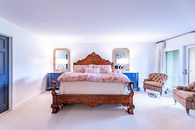 carpeted bedroom with baseboards