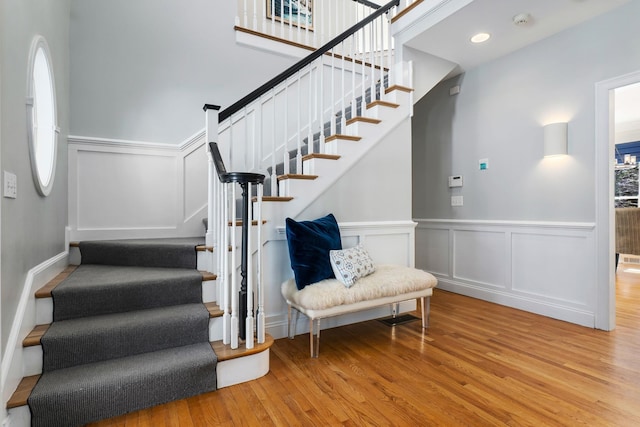 stairs with wood finished floors