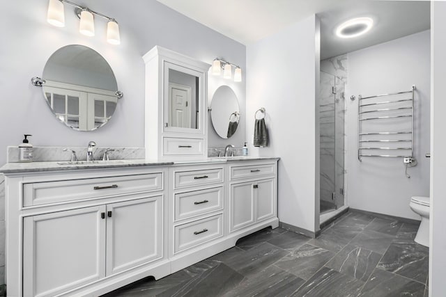 full bathroom featuring toilet, a shower stall, radiator, and a sink