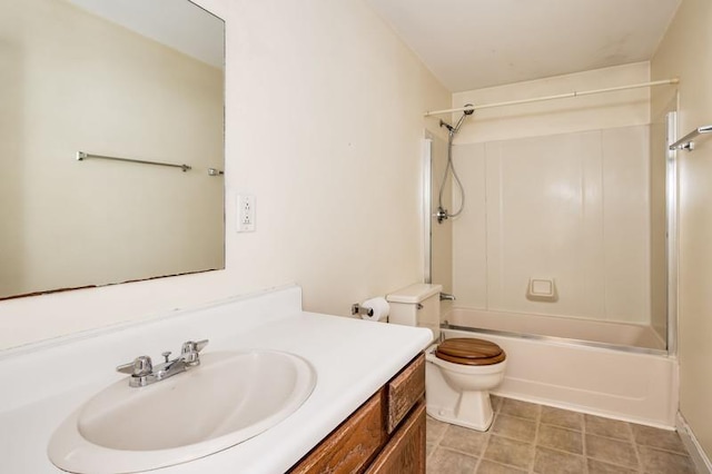 full bath featuring tile patterned floors, toilet, vanity, and  shower combination