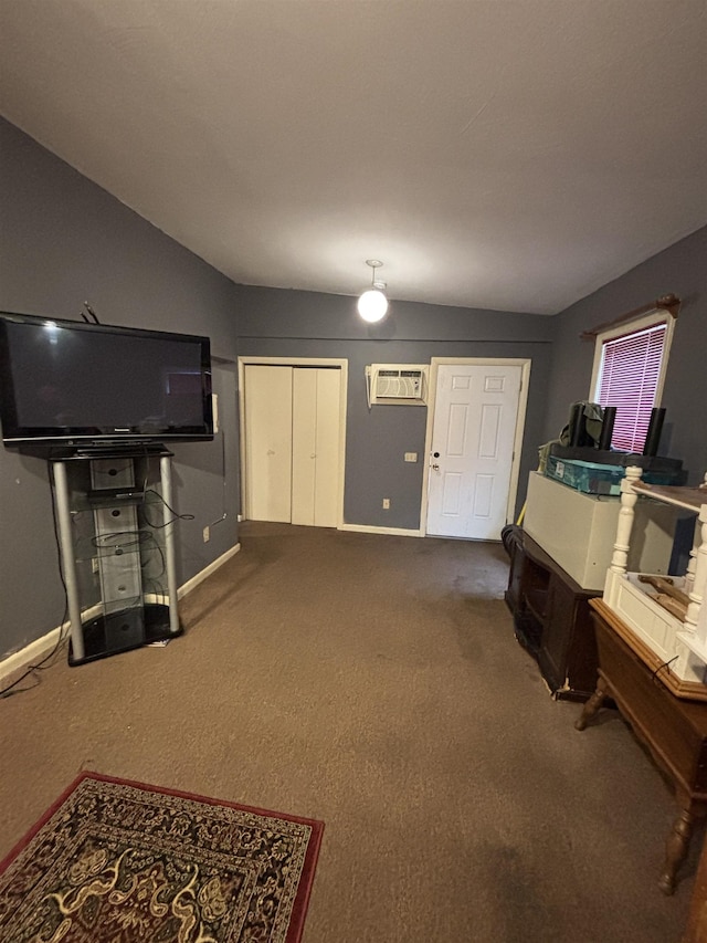 carpeted living room with baseboards and a wall unit AC