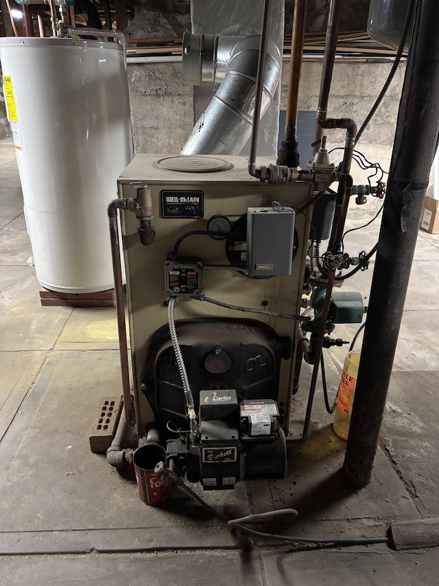 utility room featuring gas water heater and a heating unit