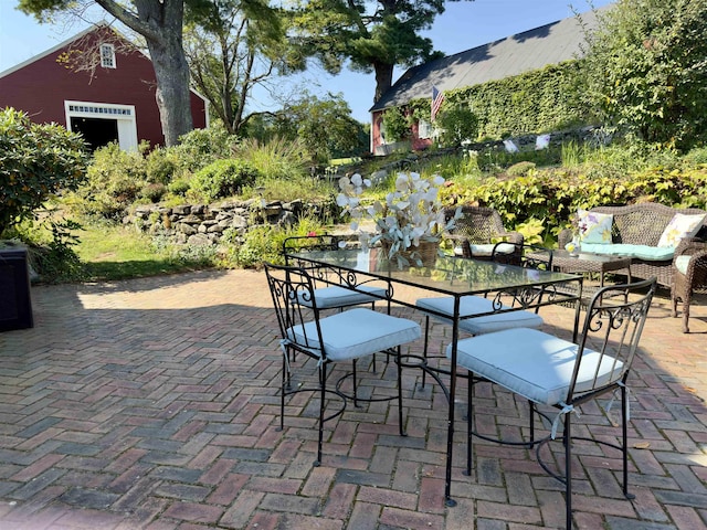 view of patio with outdoor dining area