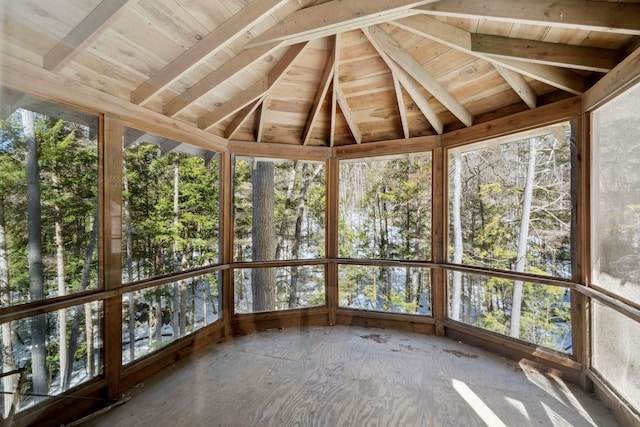 unfurnished sunroom featuring lofted ceiling