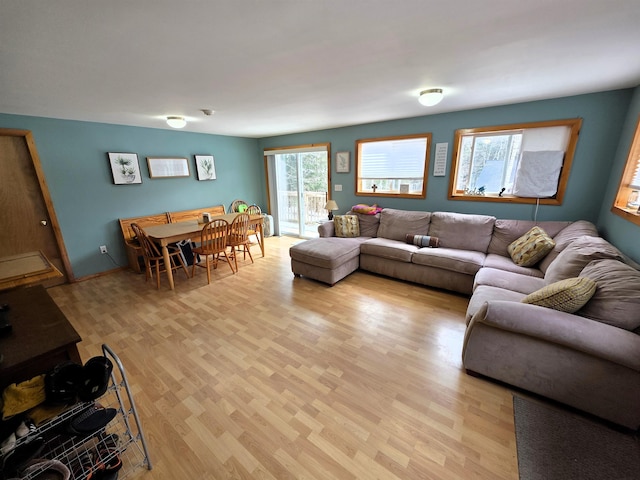 living area with light wood-style floors