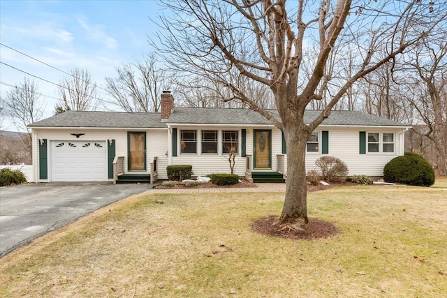 ranch-style home with roof with shingles, driveway, a chimney, a front lawn, and a garage