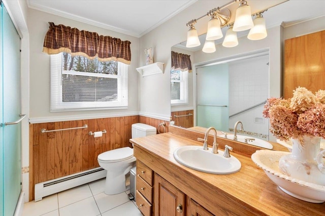 bathroom with a shower with door, a wainscoted wall, toilet, ornamental molding, and baseboard heating