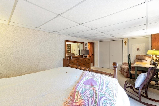 bedroom featuring a drop ceiling