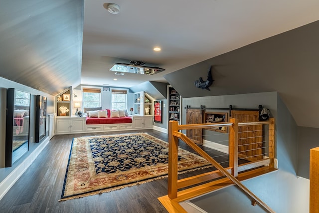 bedroom featuring recessed lighting, lofted ceiling, and wood finished floors