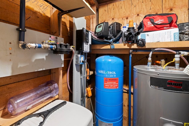 utility room with water heater