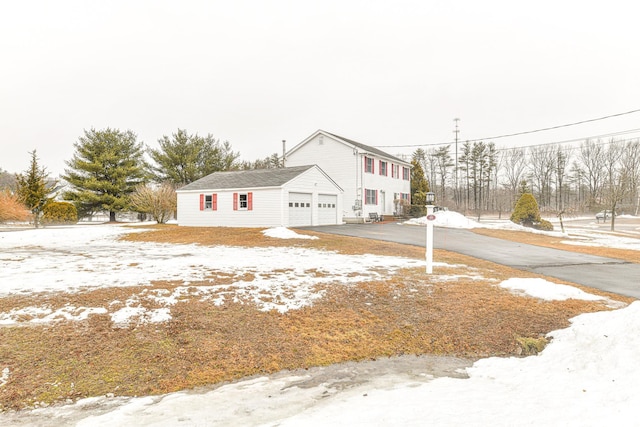 view of front of home featuring a garage and driveway