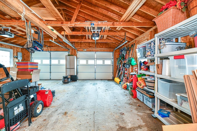 garage featuring a garage door opener