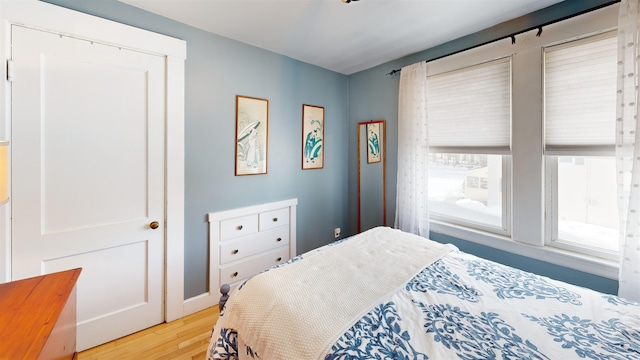 bedroom featuring light wood-style floors