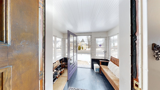 interior space featuring wood finished floors and a wealth of natural light