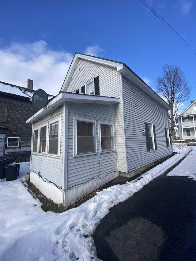 view of snow covered property