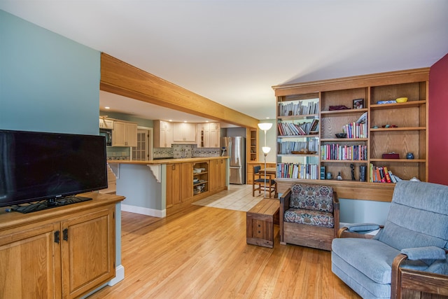 sitting room with light wood-type flooring