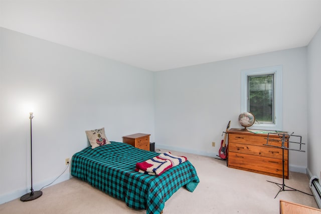 bedroom with carpet flooring, baseboards, and a baseboard radiator