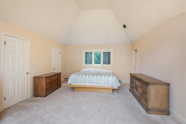 bedroom featuring baseboards, carpet, baseboard heating, and high vaulted ceiling