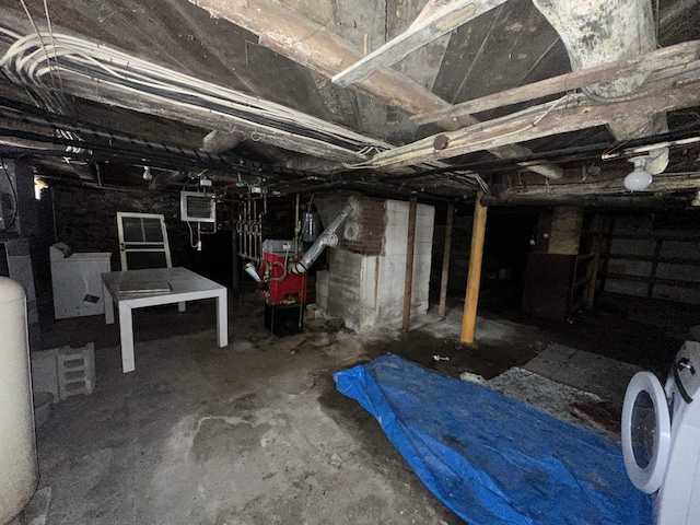 unfinished basement with washer and clothes dryer