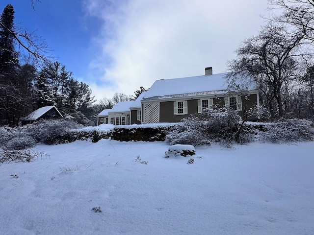 view of front of house with a chimney