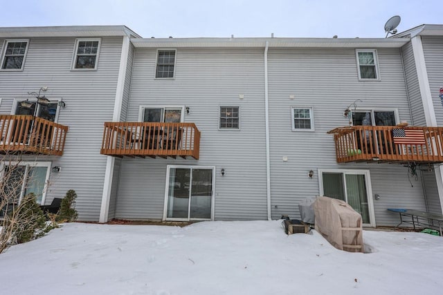 view of snow covered property