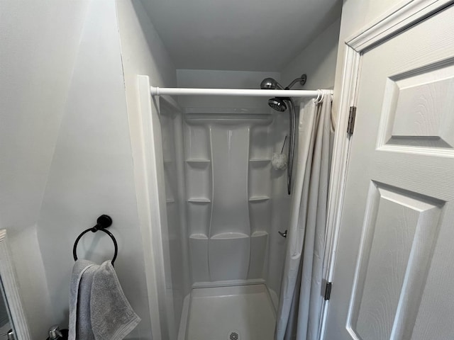 full bath featuring a stall shower