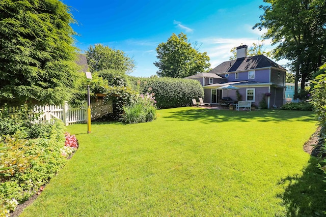 view of yard with fence