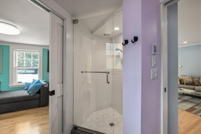 bathroom featuring recessed lighting, a shower stall, ensuite bathroom, and wood-type flooring