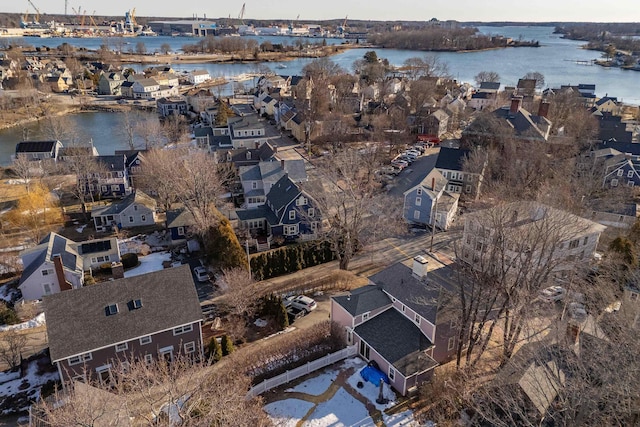 aerial view with a residential view and a water view