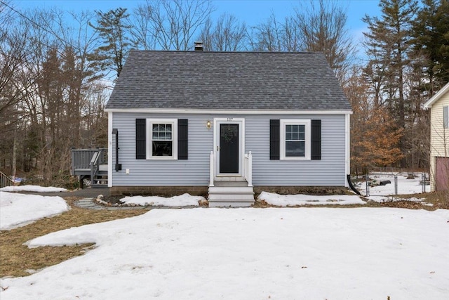 view of front of house featuring a shingled roof