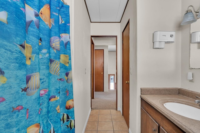 full bath with tile patterned flooring, curtained shower, and vanity