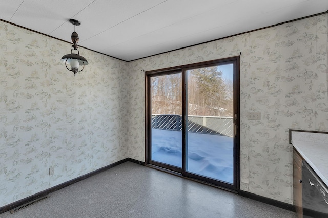 unfurnished dining area with wallpapered walls, baseboards, and visible vents