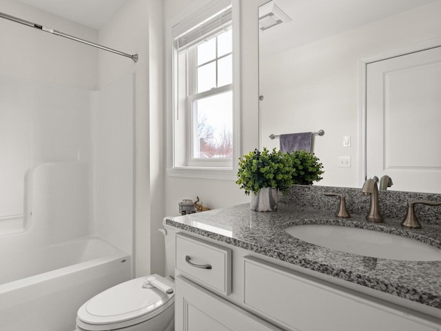 full bathroom featuring bathing tub / shower combination, visible vents, toilet, and vanity